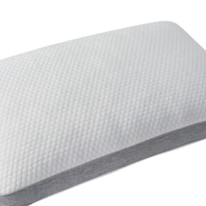 Angled view of the rectangular back sleeper version of the Sleeptone Basics Cooling Pillow, displaying the same white honeycomb texture and grey cooling side panel with a snowflake logo.